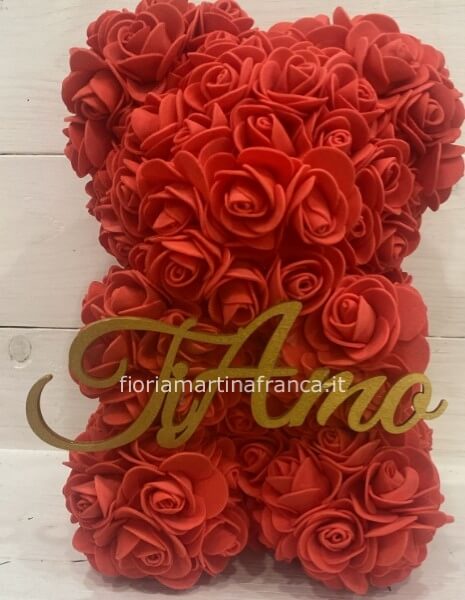 Teddy con rose rosse sintetiche h. 25 x 12 cm